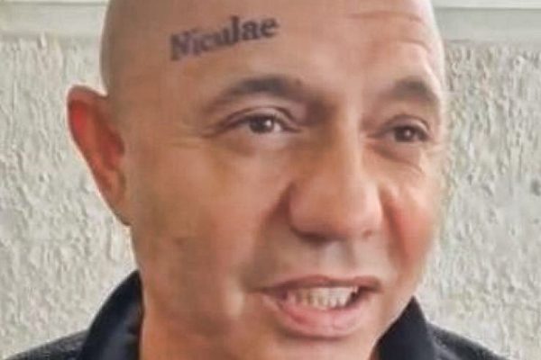guta tatuaj frunte
